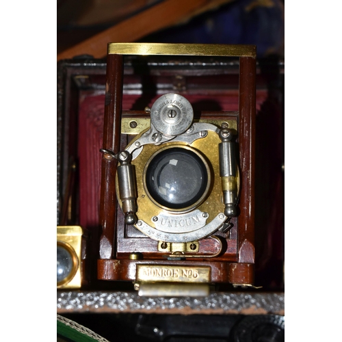 410 - ONE BOX OF VINTAGE CAMERAS AND EQUIPMENT, to include a brown leather case containing a Monroe No6 fo... 