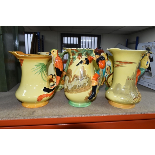 399 - SIX 1930'S BURLEIGH WARE ART DECO JUGS, comprising an exotic humming bird handle 7015, (hairline cra... 