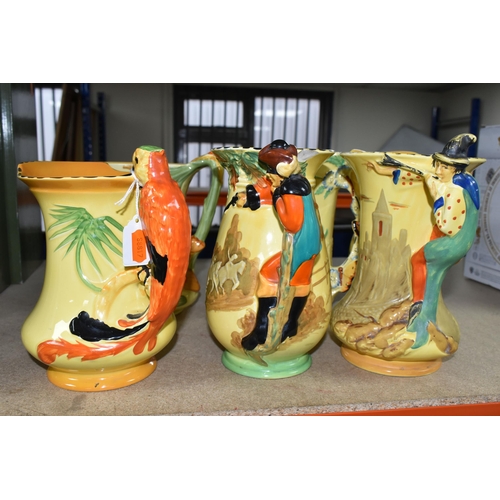 399 - SIX 1930'S BURLEIGH WARE ART DECO JUGS, comprising an exotic humming bird handle 7015, (hairline cra... 