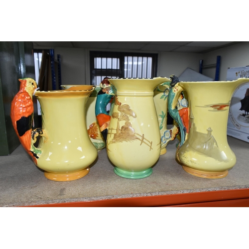 399 - SIX 1930'S BURLEIGH WARE ART DECO JUGS, comprising an exotic humming bird handle 7015, (hairline cra... 