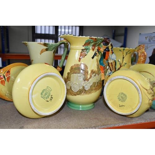 399 - SIX 1930'S BURLEIGH WARE ART DECO JUGS, comprising an exotic humming bird handle 7015, (hairline cra... 