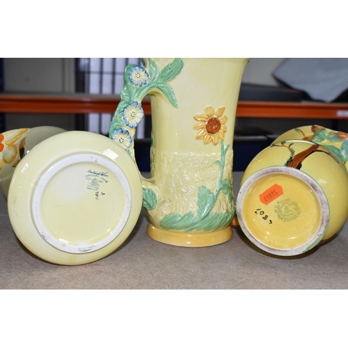 399 - SIX 1930'S BURLEIGH WARE ART DECO JUGS, comprising an exotic humming bird handle 7015, (hairline cra... 