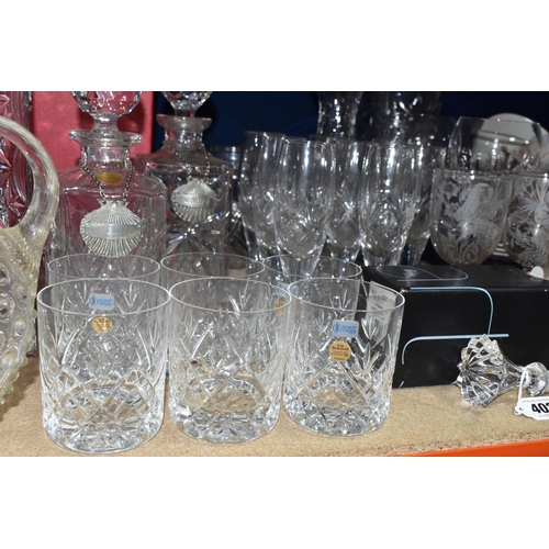 402 - A QUANTITY OF CUT CRYSTAL GLASSWARE, comprising a boxed Stuart Crystal 'Starburst' bottle stopper, a... 