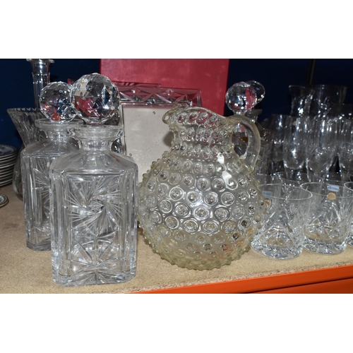 402 - A QUANTITY OF CUT CRYSTAL GLASSWARE, comprising a boxed Stuart Crystal 'Starburst' bottle stopper, a... 