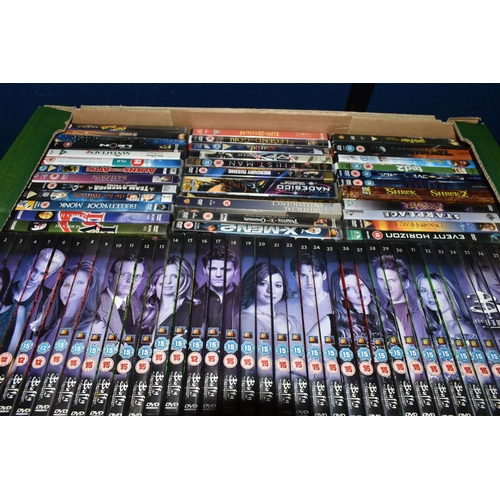 409 - FIVE BOXES OF DVDS AND CDS, over one hundred and eighty DVDs to include Buffy The Vampire, TinTin, S... 