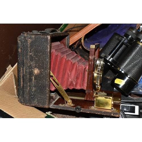 410 - ONE BOX OF VINTAGE CAMERAS AND EQUIPMENT, to include a brown leather case containing a Monroe No6 fo... 