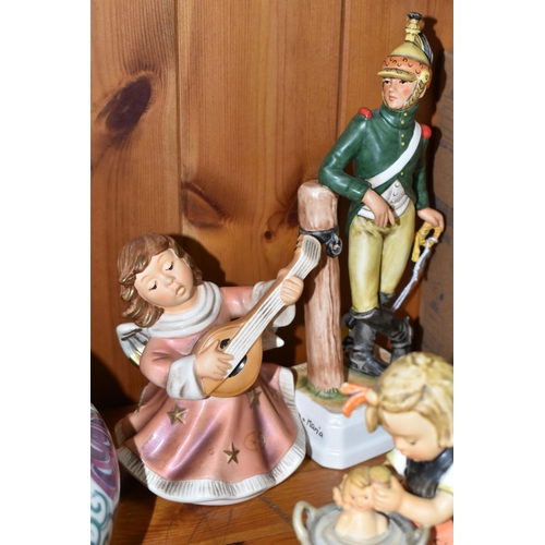 452 - A GROUP OF GOEBEL FIGURES, comprising a 'Dragon 1805' figure height 21.5cm (personalisation to base)... 