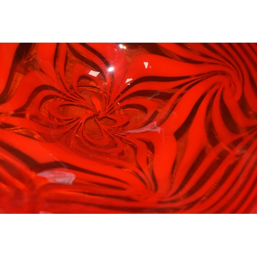 458 - A RICHARD P GOLDING, A CONTEMPORARY STUDIO GLASS FOOTED BOWL SIGNED AND DATED 2012, trailed red glas... 