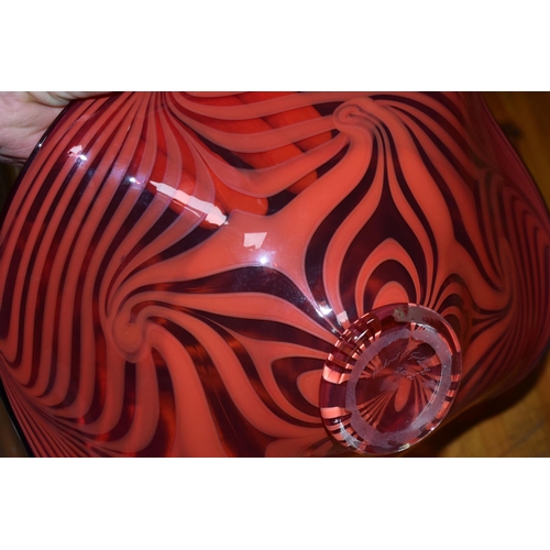 458 - A RICHARD P GOLDING, A CONTEMPORARY STUDIO GLASS FOOTED BOWL SIGNED AND DATED 2012, trailed red glas... 