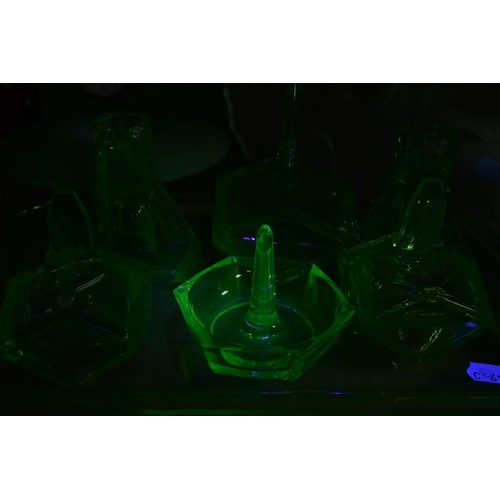 463 - A GROUP OF DECORATIVE GLASS WARE, to include uranium glass dressing table items, including a figural... 