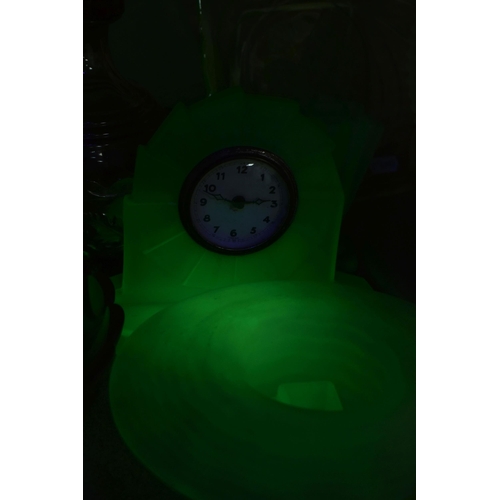 463 - A GROUP OF DECORATIVE GLASS WARE, to include uranium glass dressing table items, including a figural... 