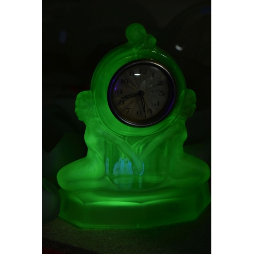 463 - A GROUP OF DECORATIVE GLASS WARE, to include uranium glass dressing table items, including a figural... 