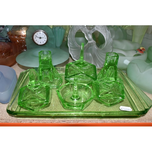 463 - A GROUP OF DECORATIVE GLASS WARE, to include uranium glass dressing table items, including a figural... 