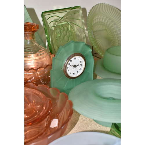 463 - A GROUP OF DECORATIVE GLASS WARE, to include uranium glass dressing table items, including a figural... 