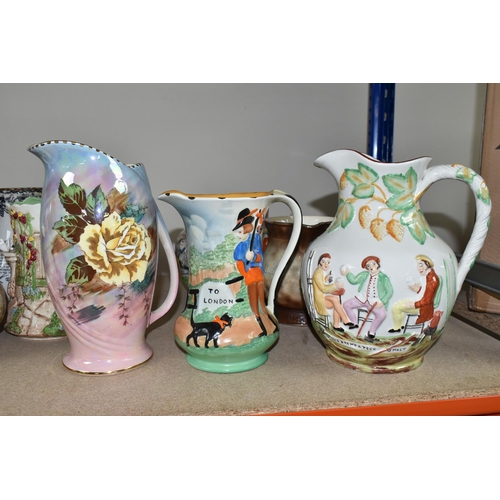 469 - A GROUP OF JUGS AND A TANKARD, comprising a Falcon Ware 'Cavalier' tankard (crazing and possible hai... 