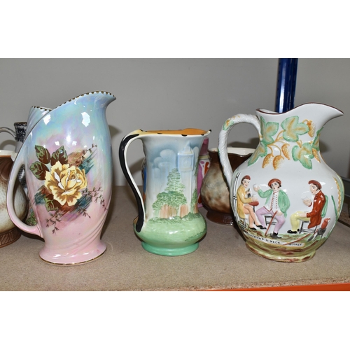 469 - A GROUP OF JUGS AND A TANKARD, comprising a Falcon Ware 'Cavalier' tankard (crazing and possible hai... 
