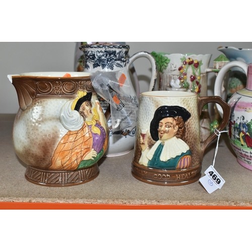 469 - A GROUP OF JUGS AND A TANKARD, comprising a Falcon Ware 'Cavalier' tankard (crazing and possible hai... 