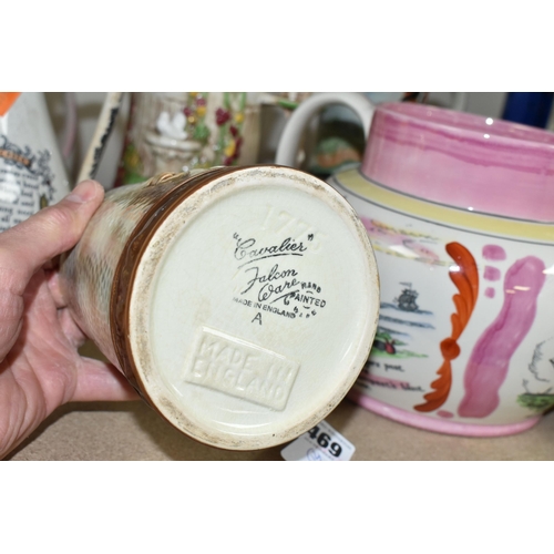 469 - A GROUP OF JUGS AND A TANKARD, comprising a Falcon Ware 'Cavalier' tankard (crazing and possible hai... 