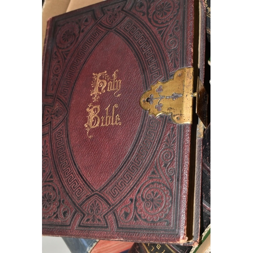 499 - FOUR ANTIQUARIAN BIBLES comprising a Broen's Self-Interpreting Family Bible, leather bound, brass cl... 