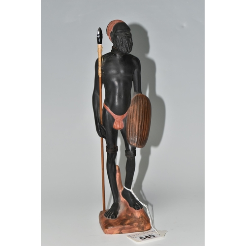 545 - AN AUSTRALIAN MID-CENTURY PIETER VAN DER HELDER ABORIGINAL FIGURE,  a slip cast ceramic figure of a ... 