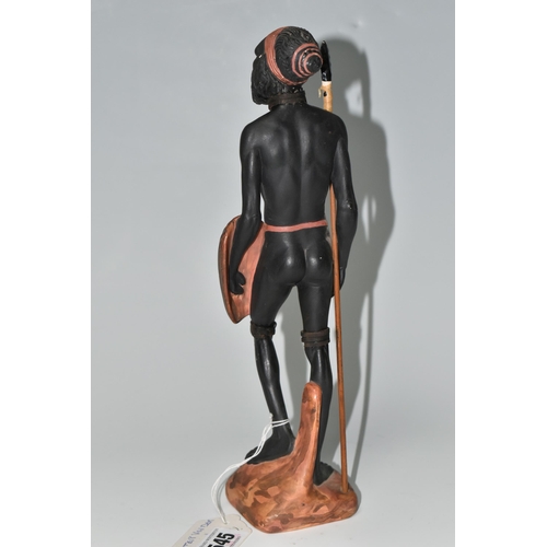 545 - AN AUSTRALIAN MID-CENTURY PIETER VAN DER HELDER ABORIGINAL FIGURE,  a slip cast ceramic figure of a ... 