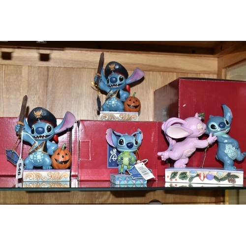 546 - FOUR BOXED DISNEY SHOWCASE COLLECTION FIGURINES, designed by Jim Shore, comprising two 'Lovable Bucc... 