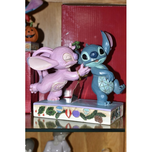 546 - FOUR BOXED DISNEY SHOWCASE COLLECTION FIGURINES, designed by Jim Shore, comprising two 'Lovable Bucc... 