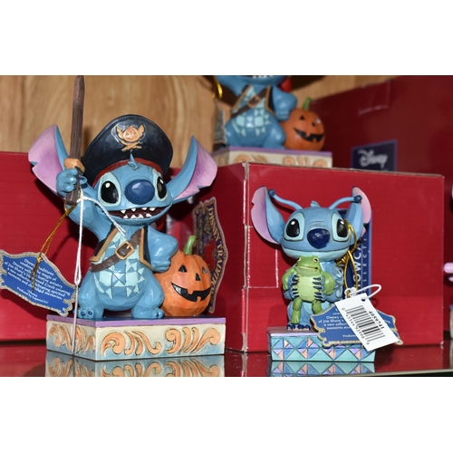 546 - FOUR BOXED DISNEY SHOWCASE COLLECTION FIGURINES, designed by Jim Shore, comprising two 'Lovable Bucc... 