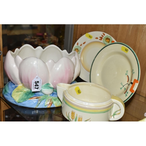 547 - FOUR PIECES OF CLARICE CLIFF CERAMICS, comprising a Newport Pottery pale pink Water Lily jardiniere ... 