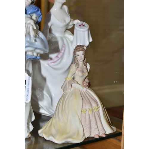 550 - A GROUP OF NAMED PORCELAIN FIGURINES, comprising Royal Doulton figures 'Paula' HN 3234 and 'Carol' H... 