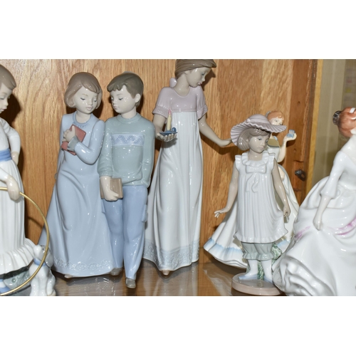 550 - A GROUP OF NAMED PORCELAIN FIGURINES, comprising Royal Doulton figures 'Paula' HN 3234 and 'Carol' H... 