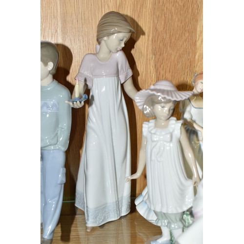 550 - A GROUP OF NAMED PORCELAIN FIGURINES, comprising Royal Doulton figures 'Paula' HN 3234 and 'Carol' H... 