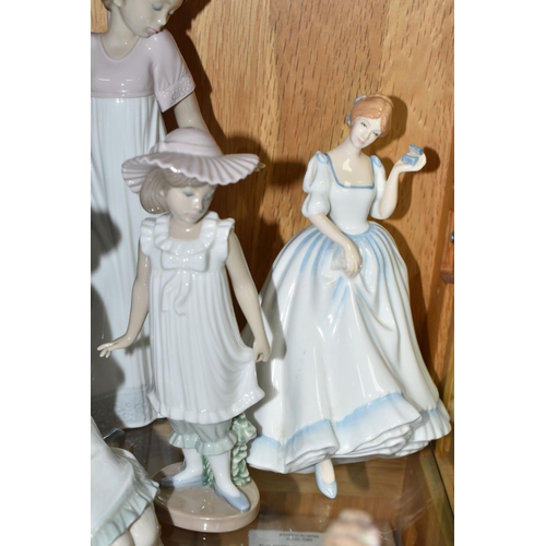 550 - A GROUP OF NAMED PORCELAIN FIGURINES, comprising Royal Doulton figures 'Paula' HN 3234 and 'Carol' H... 