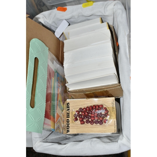 577 - EIGHT BOXES, A BASKET AND A BAG OF PAPERCRAFT SUPPLIES, to include a Stampin Up scoreboard, a paper ... 