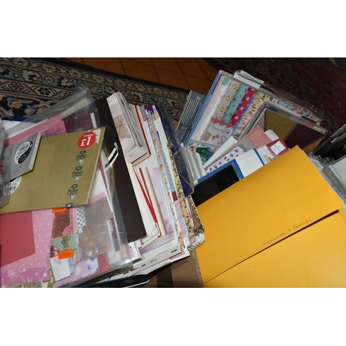 581 - SEVEN BOXES AND LOOSE PAPERCRAFTING SUPPLIES, to include 12'' x 12'', A4, A5 and smaller papers, car... 