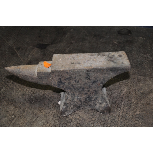 1074 - A SMALL ANVIL 14in in length