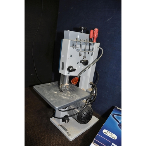 1100 - A WORKZONE BANDSAW, Blower vac in box, a Router, a Palm Router in box, a angle finding level and a d... 