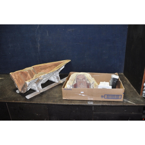 1102 - TWO ARCHITECTURAL PLASTER MOULDS and two plaster plinths formed from one of the moulds, the largest ... 