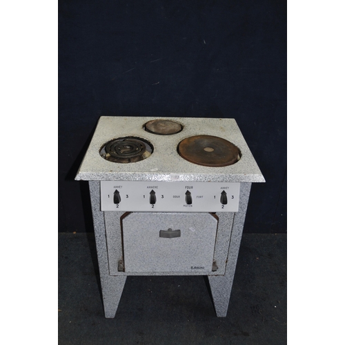 1103 - A 1950's FRENCH ELECTRIC STOVE with marbled enamel finish to body, three rings to top and oven (UNTE... 