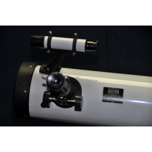 1109 - AN ASTRO ASTRONOMICAL REFLECTOR TELESCOPE, marked D90mm F640mm, with front cap and a wooden tripod s... 