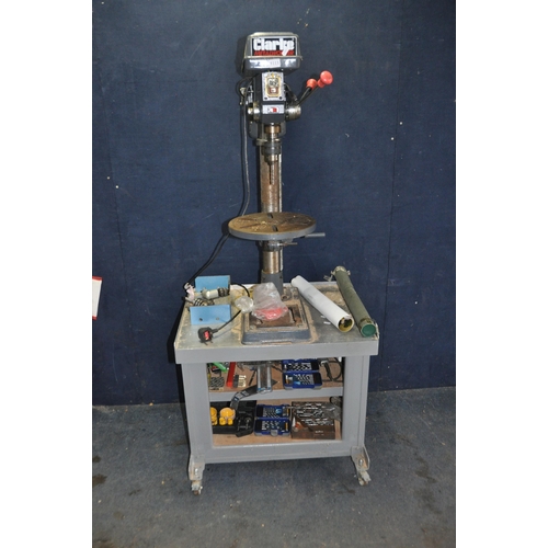 1111 - A CLARKE CDP3018 PILLAR DRILL on stand with   height and angle adjustable circular table, 80mm cut d... 