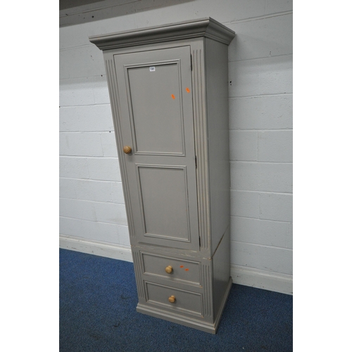 1301 - A PAINTED PINE CABINET, with a single door above two drawers, width 69cm x depth 58cm x height 194cm... 