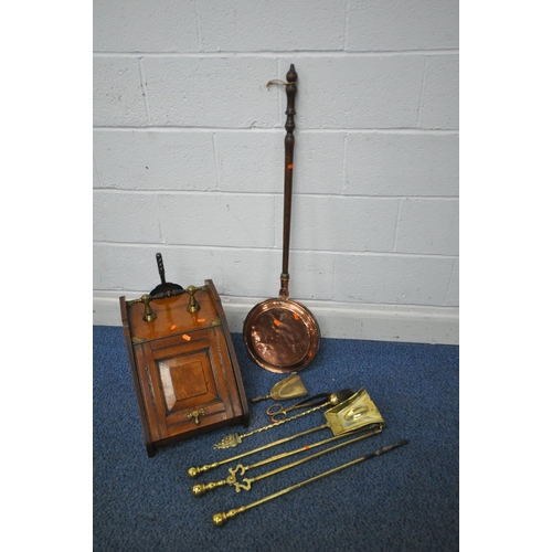 1323 - AN EARLY 20TH CENTURY OAK PURDONIUM, with a hinged door and later shovel, a copper bed pan and a com... 