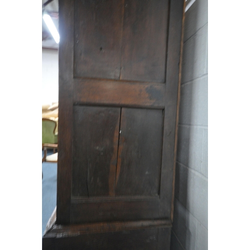 1324 - A 17TH CENTURY AND LATER OAK TWO DOOR CUPBOARD, the double fielded panel doors enclosing an open int... 