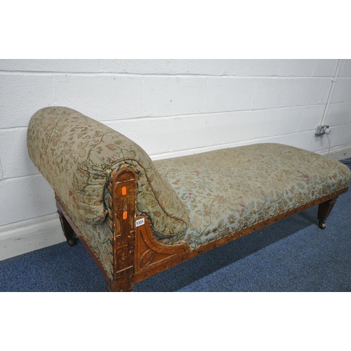 1330 - A LATE 19TH/EARLY 20TH CENTURY PITCH PINE CHAISE LOUNGE, with foliate upholstery, length 175cm x dep... 