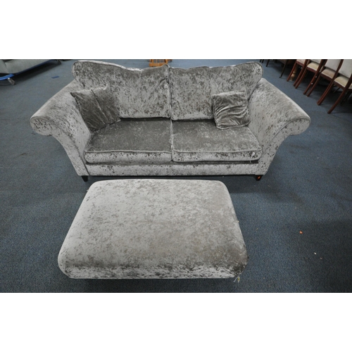 1332 - A DFS GREY UPHOLSTERED TWO PIECE SUITE, comprising a two seater sofa, with scrolled arms, length 213... 