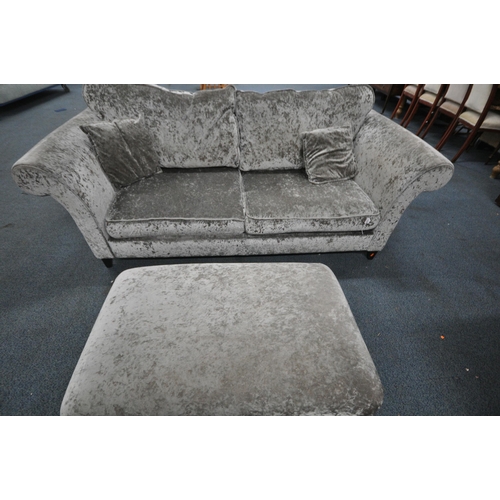 1332 - A DFS GREY UPHOLSTERED TWO PIECE SUITE, comprising a two seater sofa, with scrolled arms, length 213... 