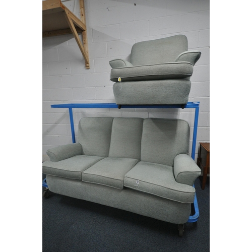 1333 - A TEAL UPHOLSTERED TWO PIECE LOUNGE SUITE, comprising a three seater sofa 188cm x depth 90cm x heigh... 