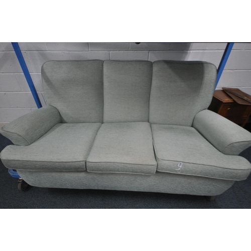 1333 - A TEAL UPHOLSTERED TWO PIECE LOUNGE SUITE, comprising a three seater sofa 188cm x depth 90cm x heigh... 