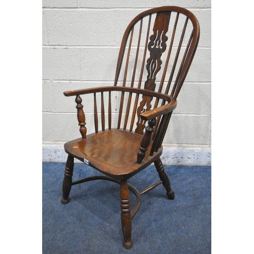 1198 - A 19TH CENTURY OAK AND BEECH WINDSOR ARMCHAIR, with a hooped and spindle back rest, a central splat ... 